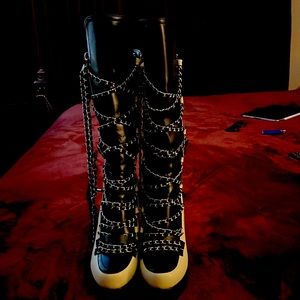 Beautiful stylish boots with chains